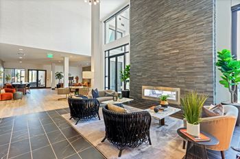 Social lounge with fireplace & coffee bar